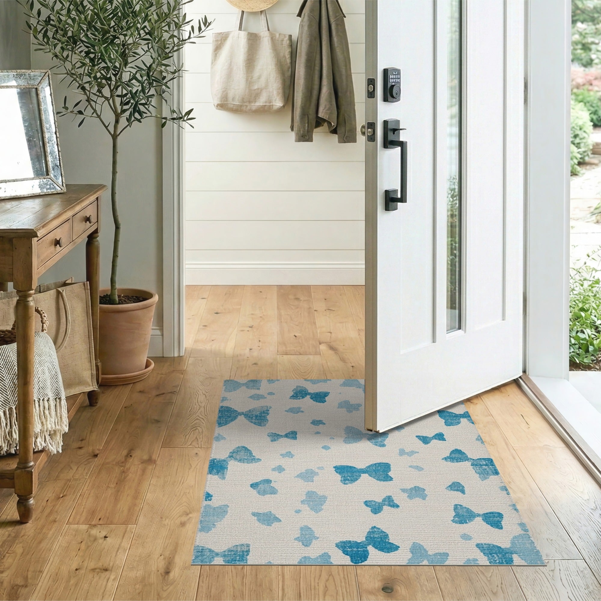 Distressed Blue Butterfly Silhouette Area Rug