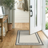Elegant Beige Area Rug with Ornate Black Border