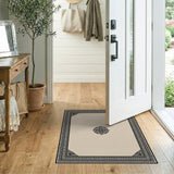 Ornate Beige Area Rug with Black Frame