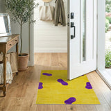 Playful Yellow Shag Area Rug with Purple Footprints