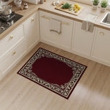 Ornate Maroon Area Rug with Cream Floral Border