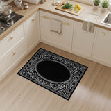 Ornate Filigree Oval Black White Area Rug