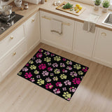 Playful Pink Yellow Paw Prints Black Area Rug
