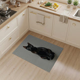 Curious Black Kitten Area Rug
