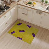 Playful Yellow Shag Area Rug with Purple Footprints