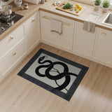 Bold Coiled Snake Area Rug