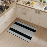 Bold Black and White Vertical Stripe Rug