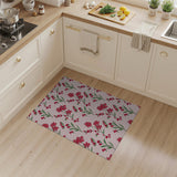 Red Floral Blooms on Pink Area Rug