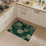 Lush Monstera Leaves Emerald Area Rug
