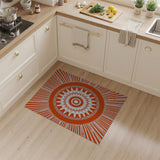 Radiant Orange Sunburst Geometric Area Rug