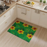 Vibrant Yellow Hibiscus on Green Area Rug