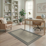 Beige Area Rug with Black Tassel Border