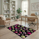 Playful Pink Yellow Paw Prints Black Area Rug