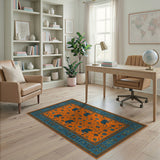 Vibrant Orange Elephant Motif Rug with Blue Border
