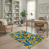 Vibrant Blue Leaves on Yellow Area Rug