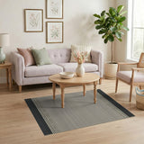 Black Spotted Border Beige Area Rug