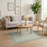 Teal Ornate Border Cream Area Rug