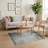 Faded Teal Tree Silhouette Distressed Area Rug