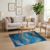 Blue and Teal Abstract Blue Wave Coastal Area Rug