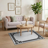 Geometric Black White Border Area Rug