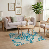 Blue Floral Medallion Area Rug on Cream
