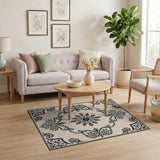 Ornate Beige Persian Area Rug with Black Floral Medallion