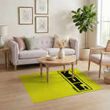 Vibrant Yellow Area Rug with Bold Black MOL Logo