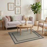 Beige Woven Rug with Bold Black Border