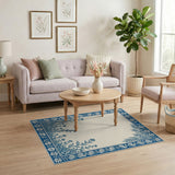 Blue Floral Engraved Border Area Rug