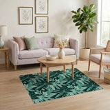 Teal Palm Leaf Area Rug on Emerald Green