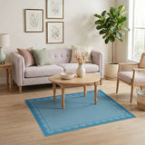 Light Blue Scalloped Border Area Rug
