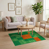Bold Green Geometric Area Rug with Orange Accents