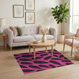 Bold Black Feathers on Vibrant Pink Area Rug