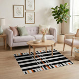 Bold Black White Striped Area Rug with Orange Accents