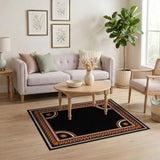 Black Area Rug with Intricate Orange Border