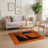 Bold Orange Black Halftone Geometric Area Rug