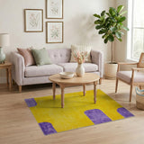 Vibrant Yellow Shag Rug with Purple Geometric Blocks