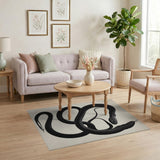 Black Coiled Snake Area Rug