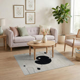 Geometric Black Yin-Yang Beige Area Rug