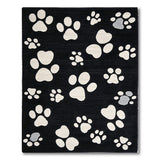 Playful White Paw Print Area Rug on Black